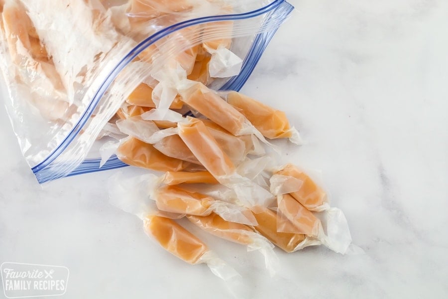 A Ziplock bag filled with caramels wrapped in wax paper.