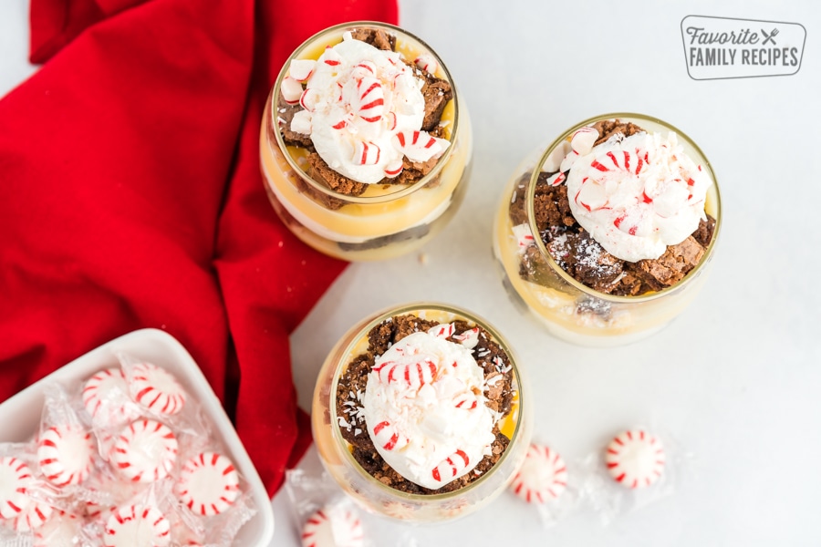Parfaits topped with whipped cream and crushed peppermint