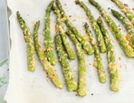 Roasted Asparagus on a parchment paper lined baking sheet
