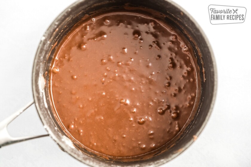 Texas Sheet Cake frosting in a sauce pan