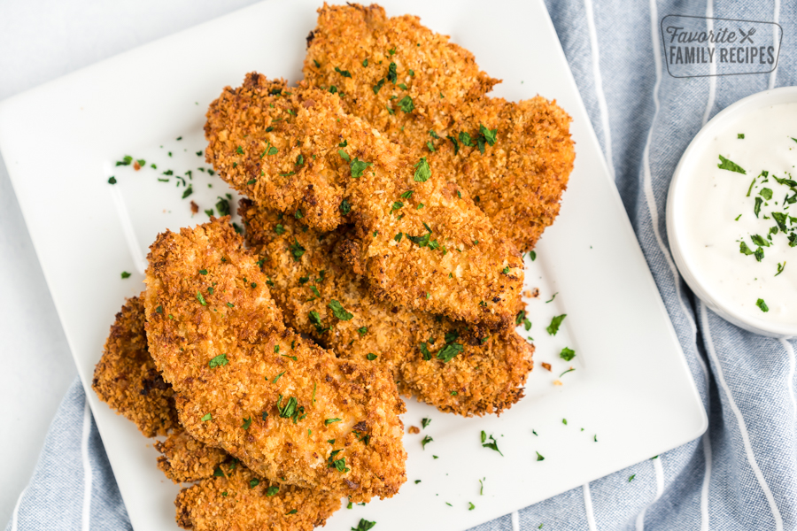 Chicken Tenders stacked on a plate