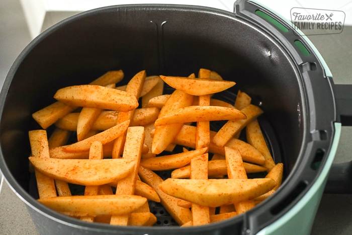 Fries arranged in air fryer