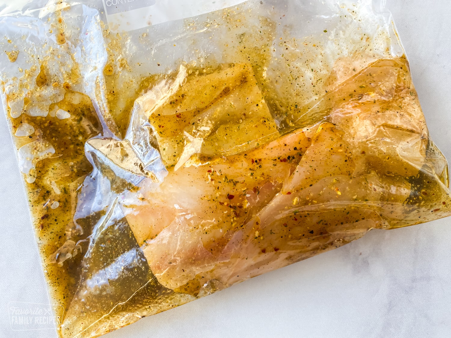 Mahi mahi in marinade in a bag