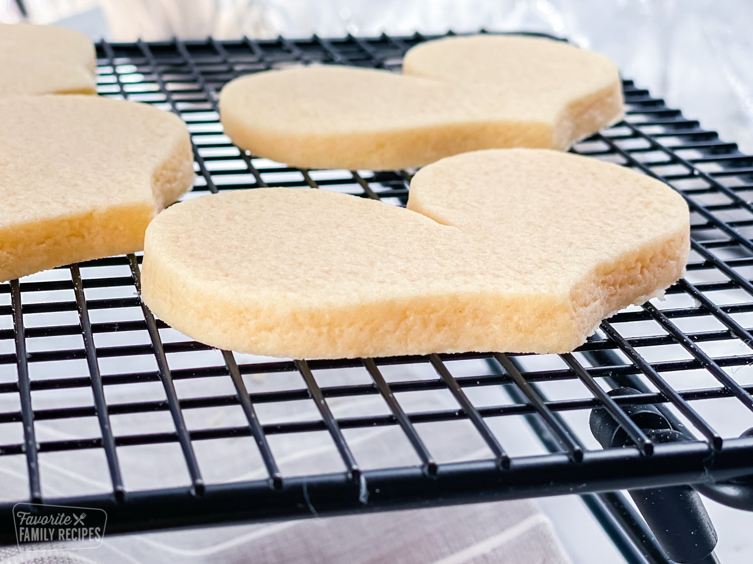 Side view of sugar cookie to show thickness and clean edges