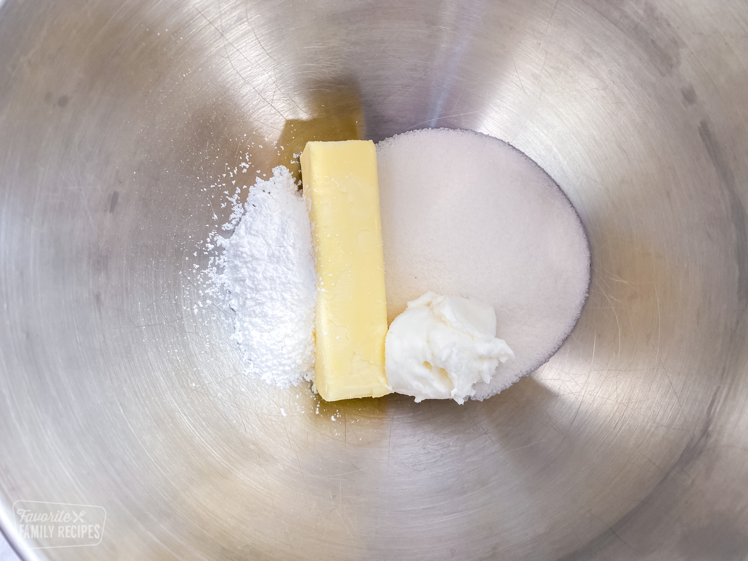 Sugar, butter, and shortening in a bowl for sugar cookies