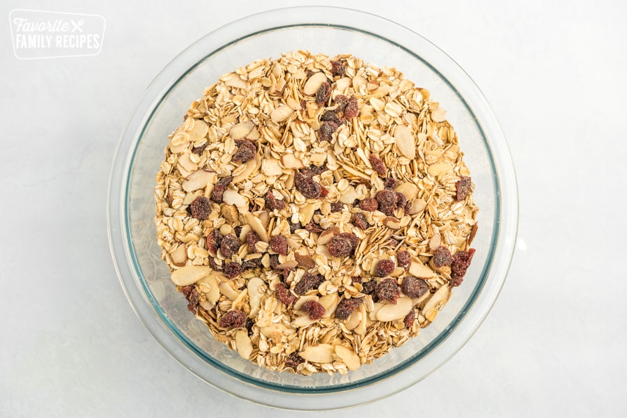 Oats, almonds, craisins, and spices in a bowl