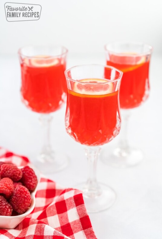Three glasses of raspberry cordial
