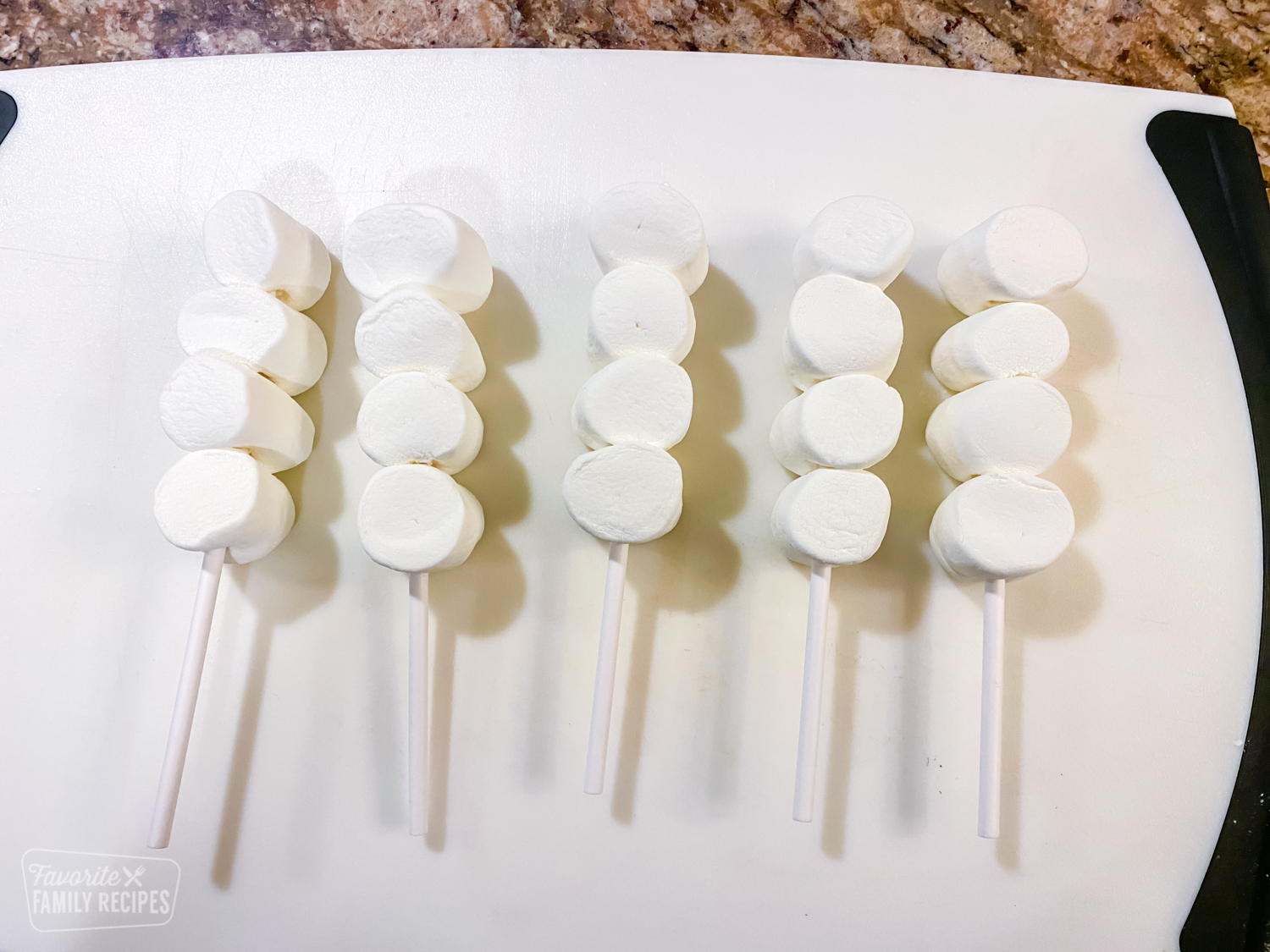 marshmallows stacked on a stick