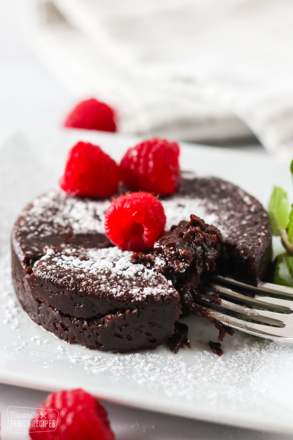 Close up of a fork cutting into a lava cake made in the Instant Pot