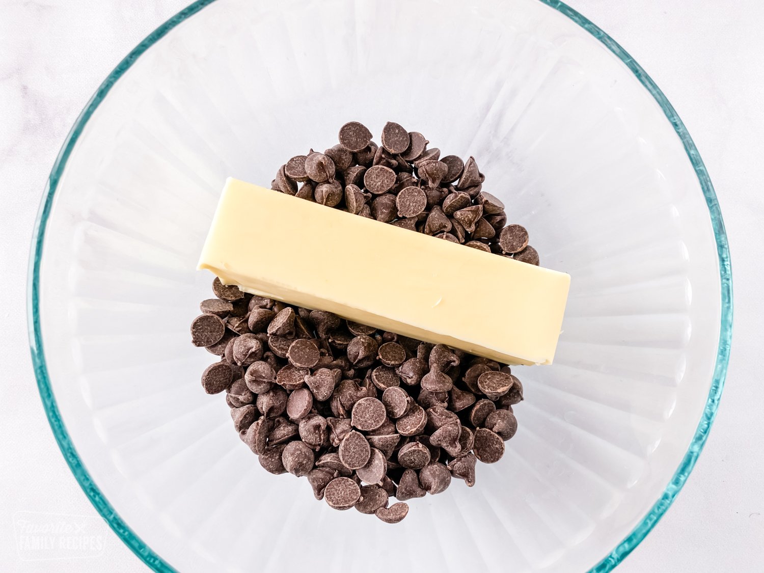 Chocolate chips and butter in a bowl to make chocolate lava cake in the Instant Pot