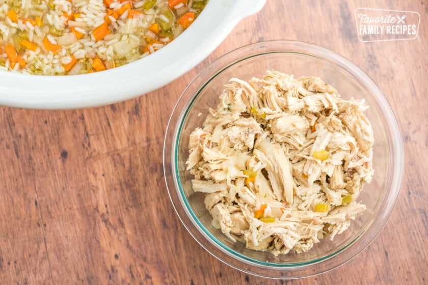 Shredded chicken in a glass bowl