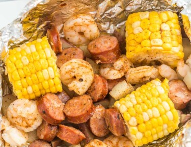 A Cajun Shrimp Foil Packet opened on a plate