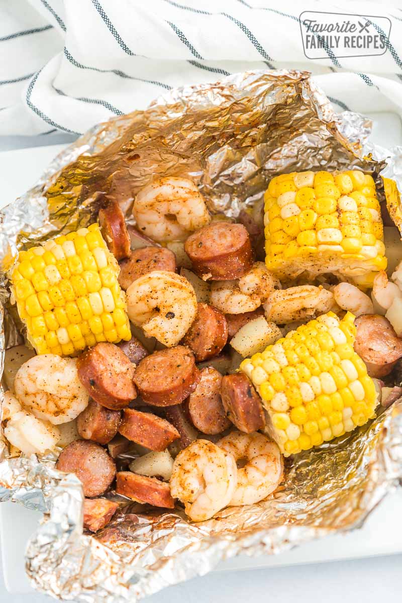 A Cajun Shrimp Foil Packet opened on a plate