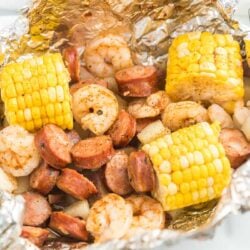 An open Cajun Shrimp Foil Packet on a plate