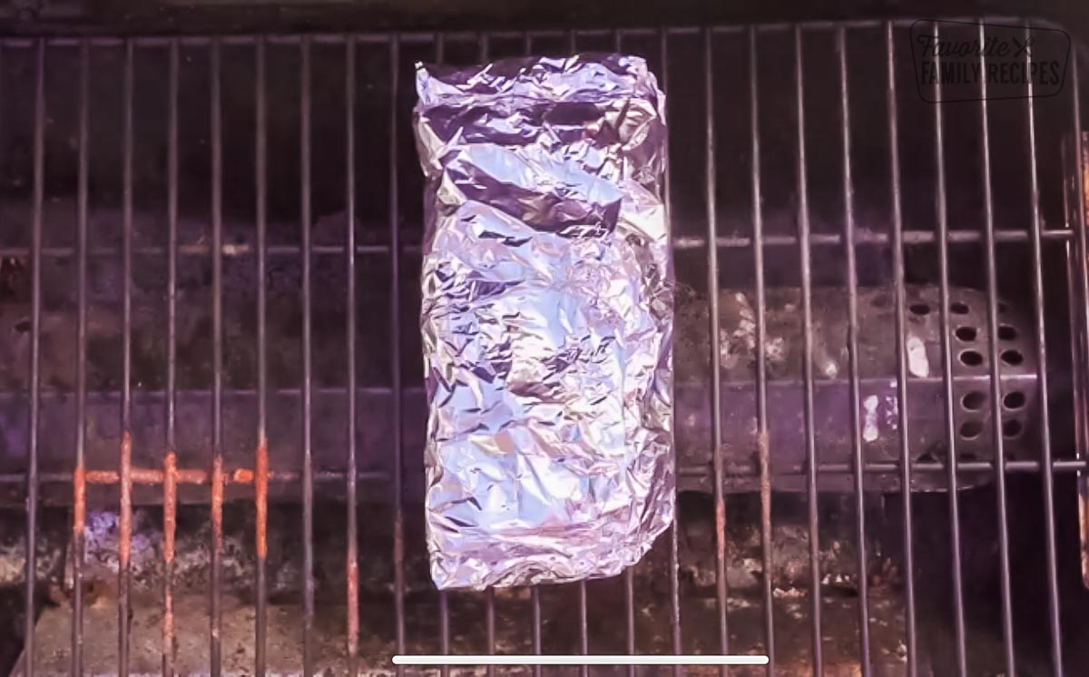 A cajun shrimp foil packet on the grill