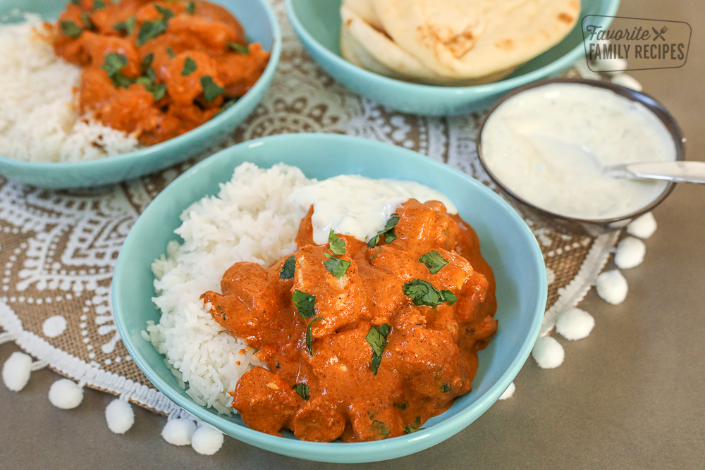 Chicken Tikka Masala in 2 bowls with rice