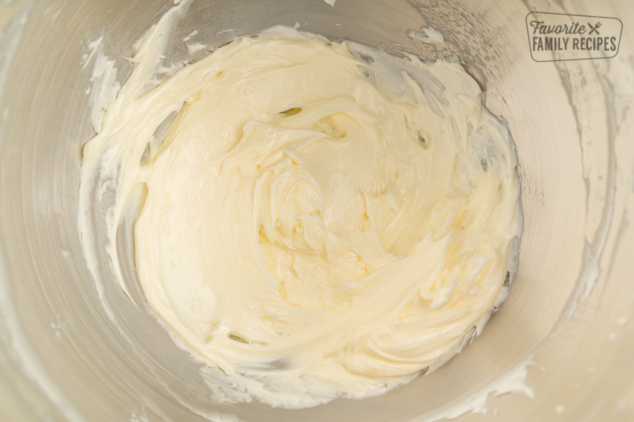 Whipped butter in a silver mixing bowl