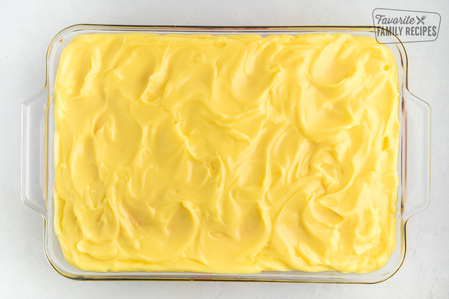 A cake frosted with lemon pudding