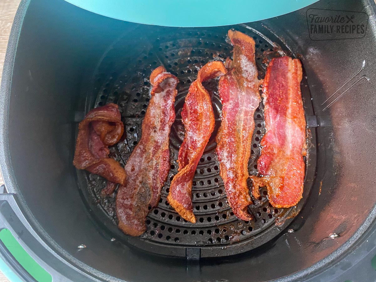 Fully cooked bacon in an air fryer.