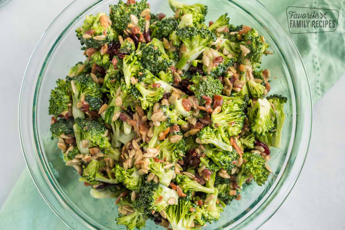 Broccoli salad in a glass bowl.