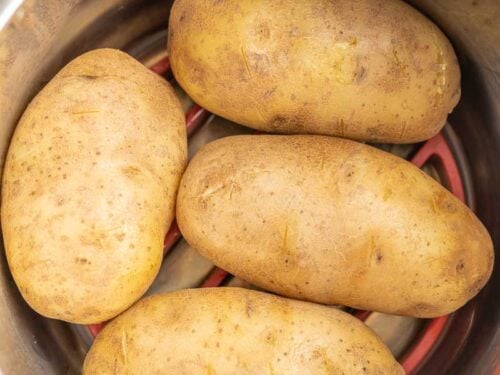 Four baked potatoes in an instant pot