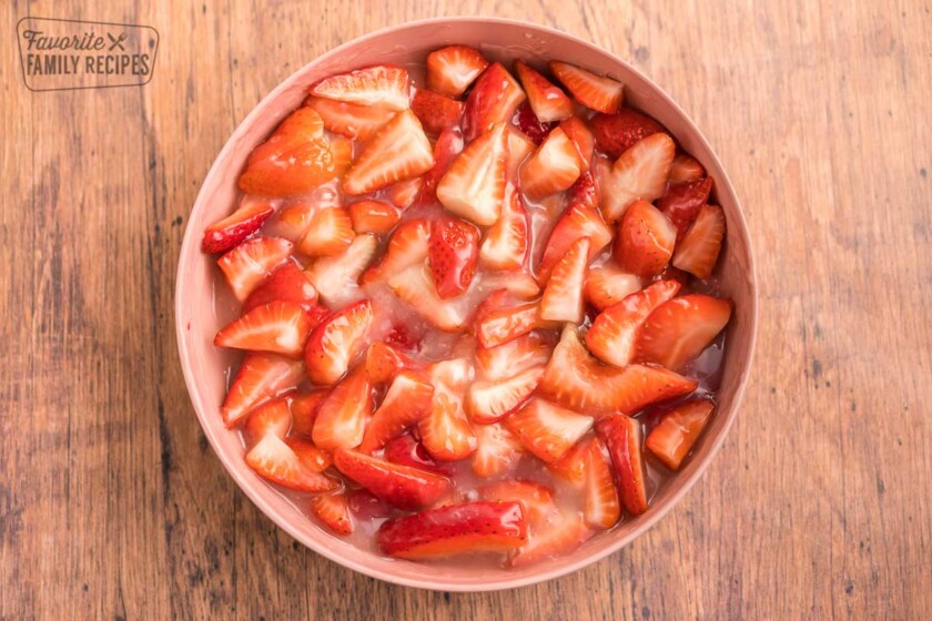 Glazed strawberries in a bowl.