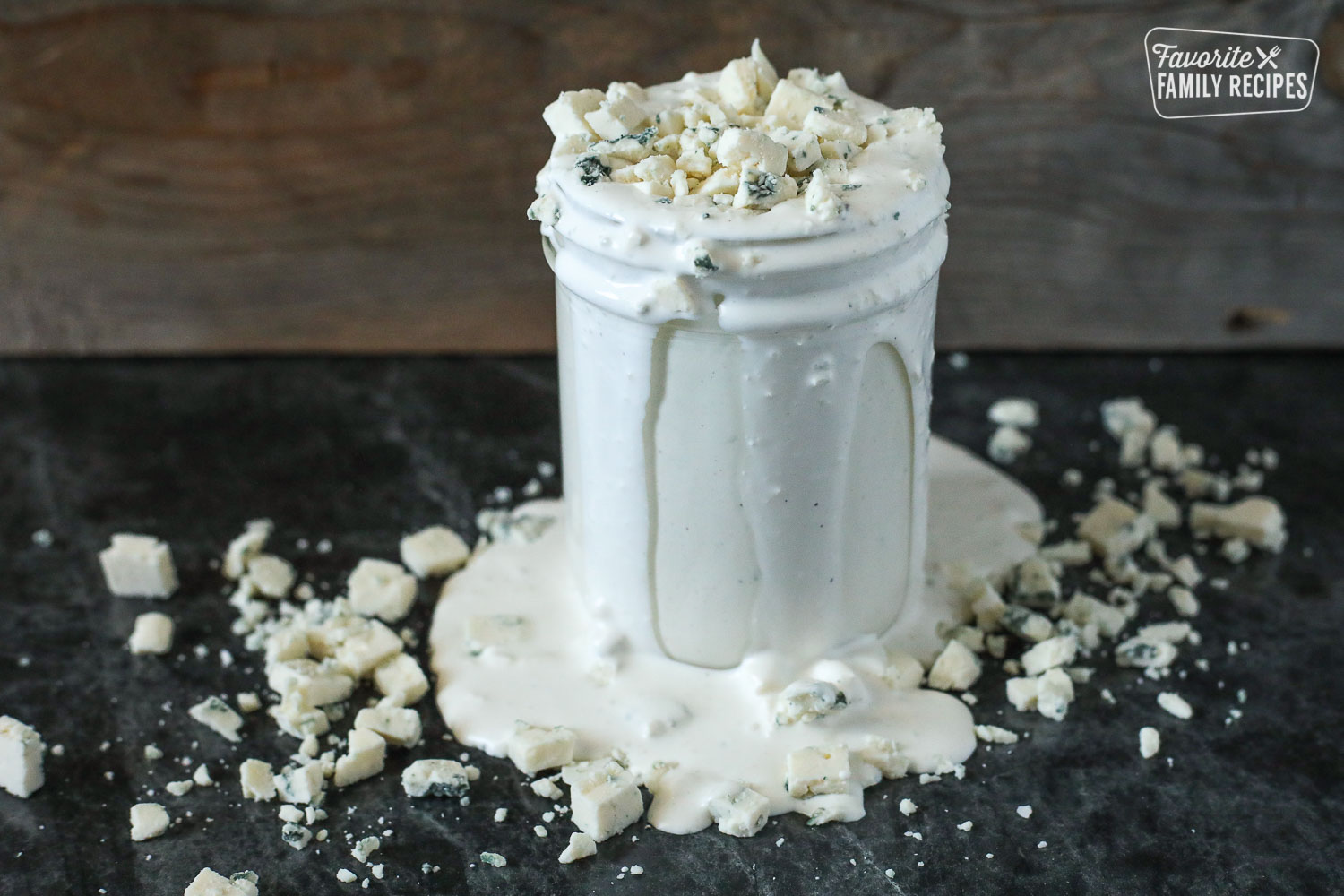 Over flowing Blue Cheese Dressing in a Glass Jar