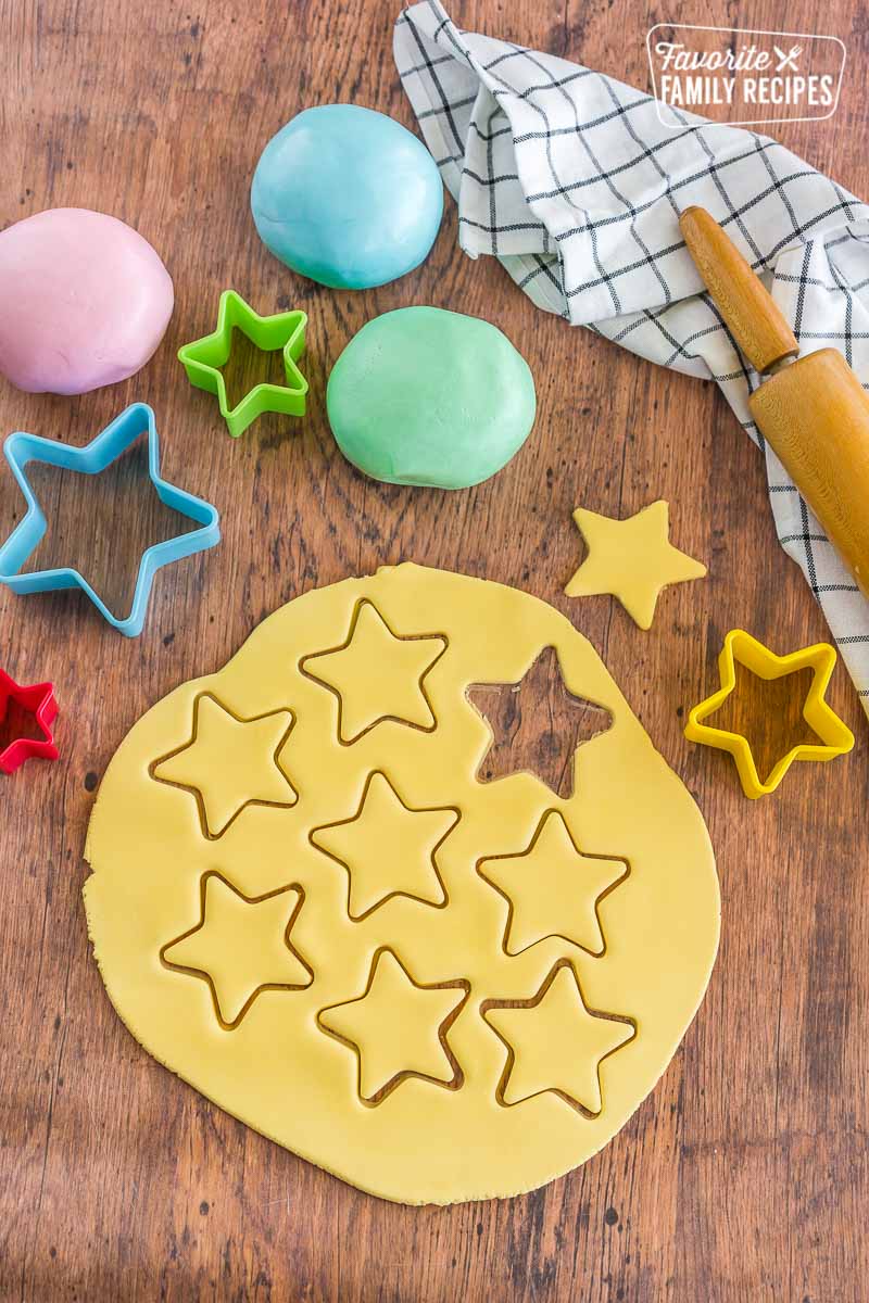 Yellow fondant rolled out with cut-out stars