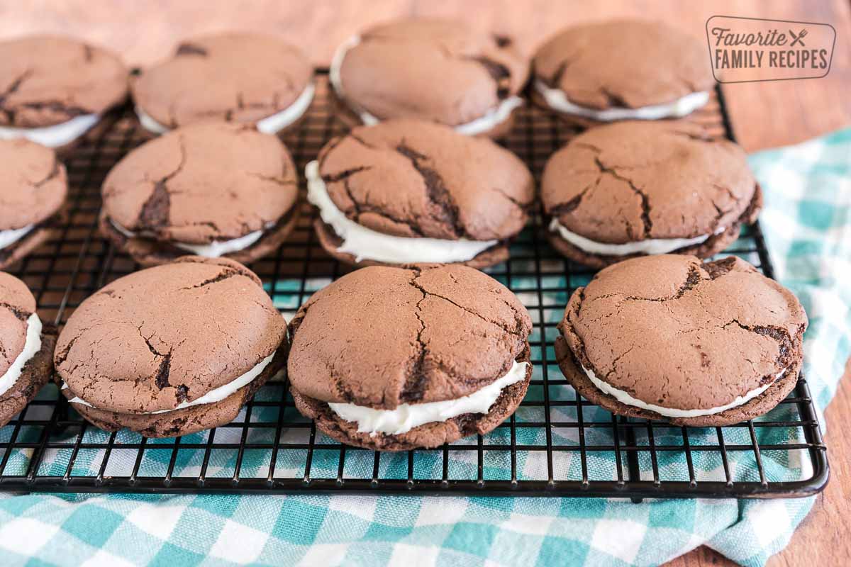 Homemade oreos on a cooling rack.