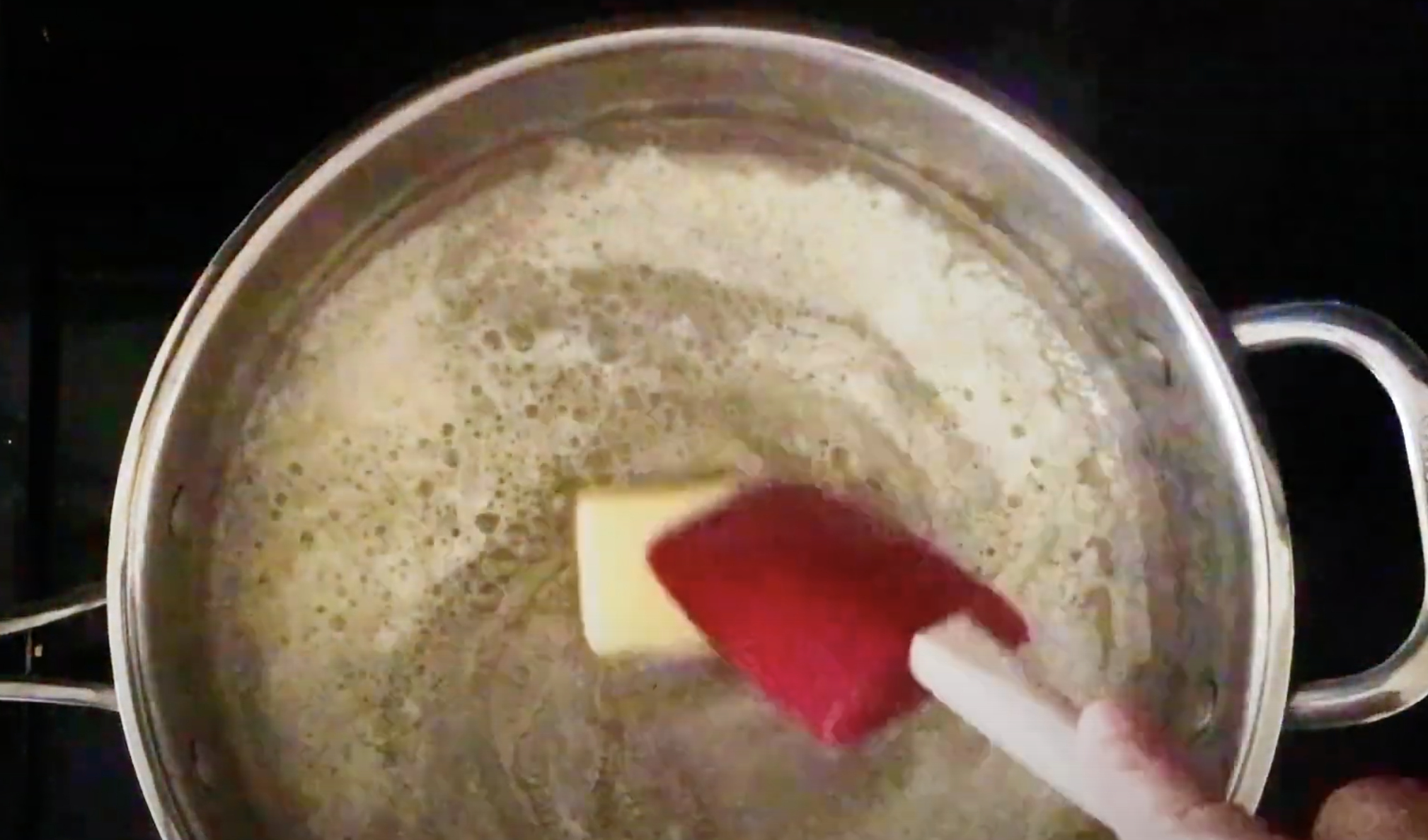 Butter being melted in a skillet