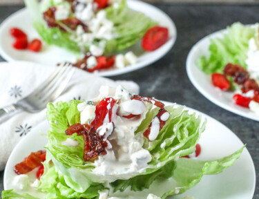 3 Wedge salads with bacon, tomatoes, and blue cheese