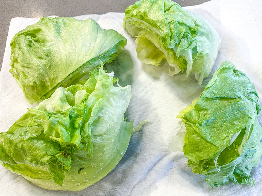 Iceberg Lettuce cut into 4 equal sections
