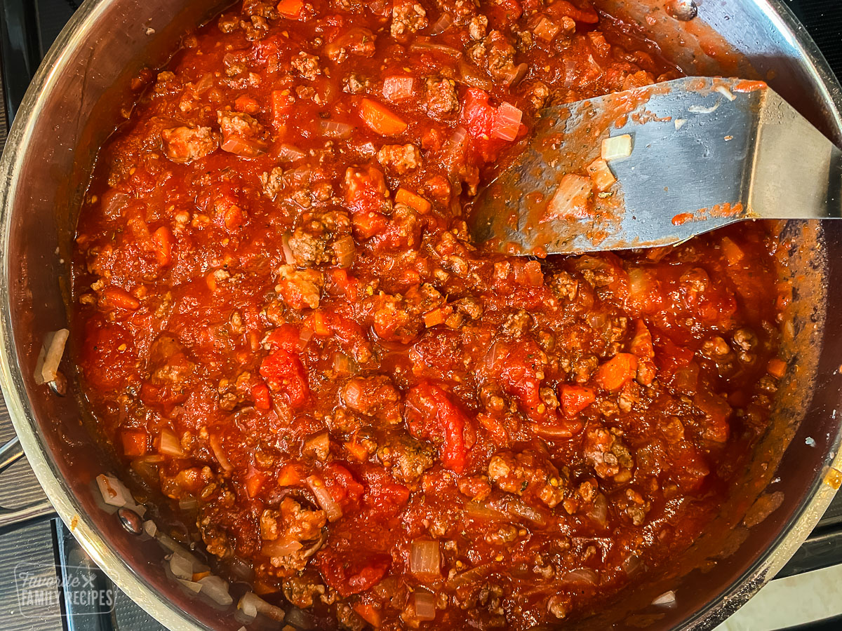 Spaghetti sauce in a skillet with meat.