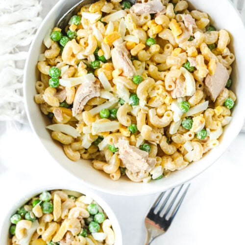 Tuna macaroni salad with peas and hard boiled egg.