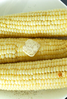 A plate of 3 cooked Air Fryer Corn on the Cob