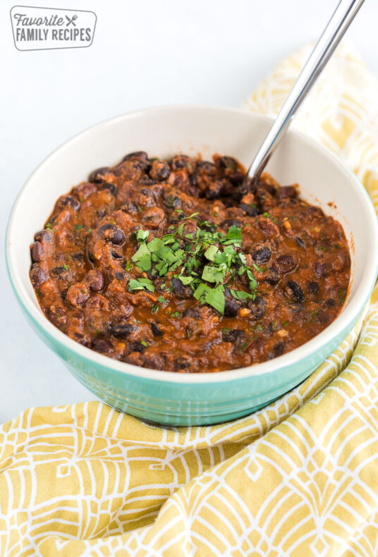 Black beans in a bowl topped with cilantro