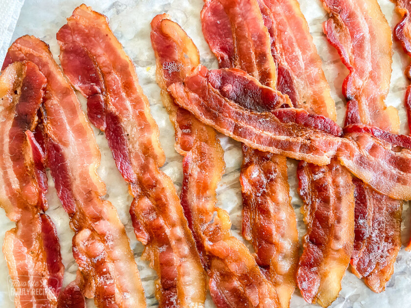9 slices of bacon on a baking sheet