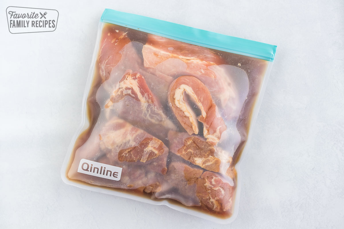 Boneless pork ribs marinating in a bag