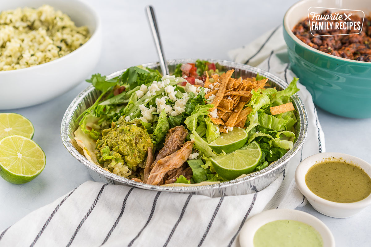 A homemade cafe rio sweet pork salad in a metal tin