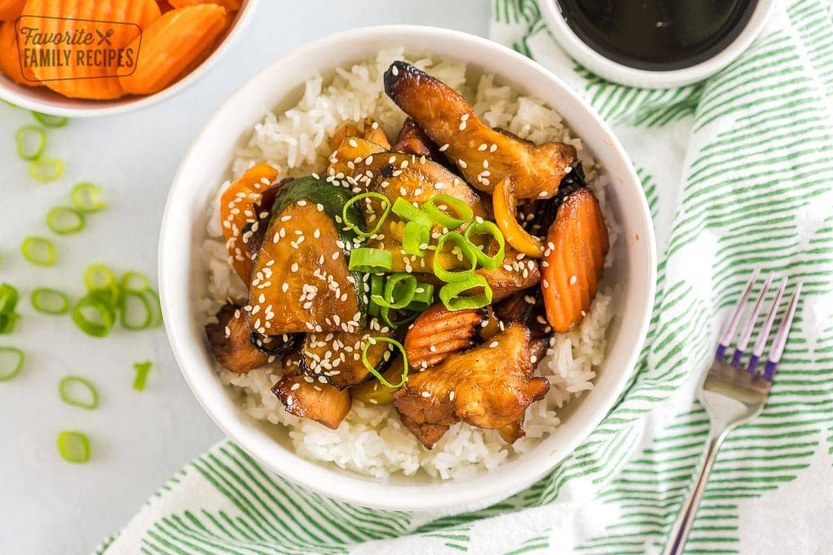 An air fryer teriyaki chicken bowl with rice.