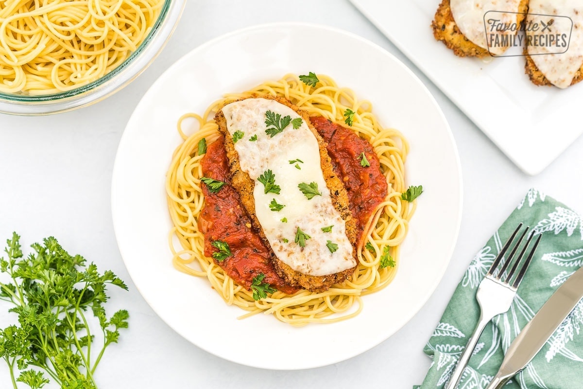 Chicken parmesan on a plate.