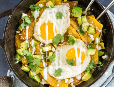 Chilaquiles with eggs in a cast iron skillet