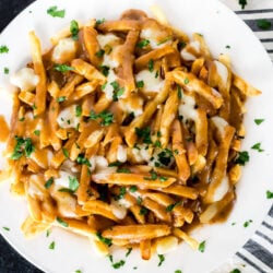 A place of poutine with fries, gravy, and cheese curds