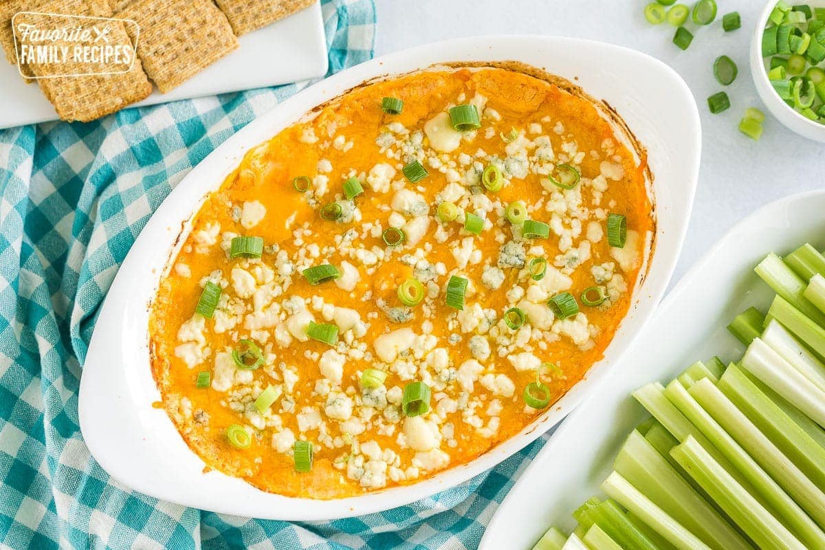 An oval baking dish full of buffalo chicken dip