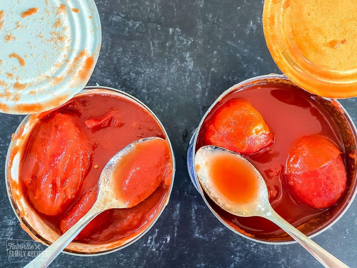 A comparison of canned tomatoes side-by-side. One in a thick tomato puree, the other in a watery tomato sauce