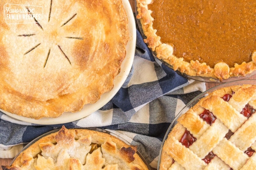 Four different pies each with a different type of crust.