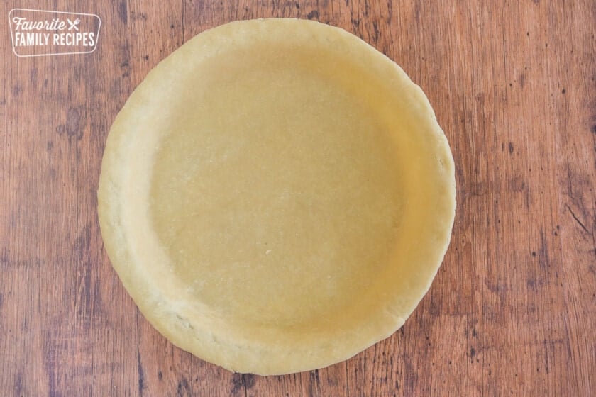 Pie crust shaped into a pie plate.