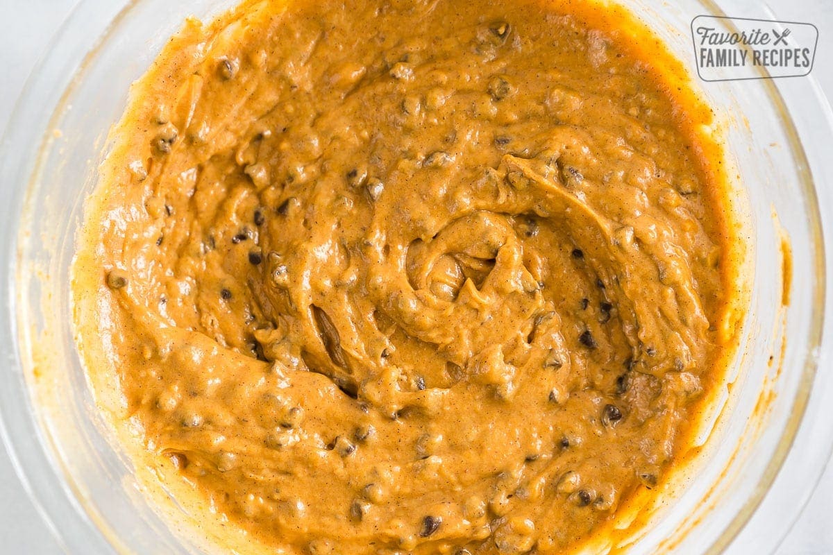 Pumpkin Chocolate Chip Muffin batter in a glass bowl