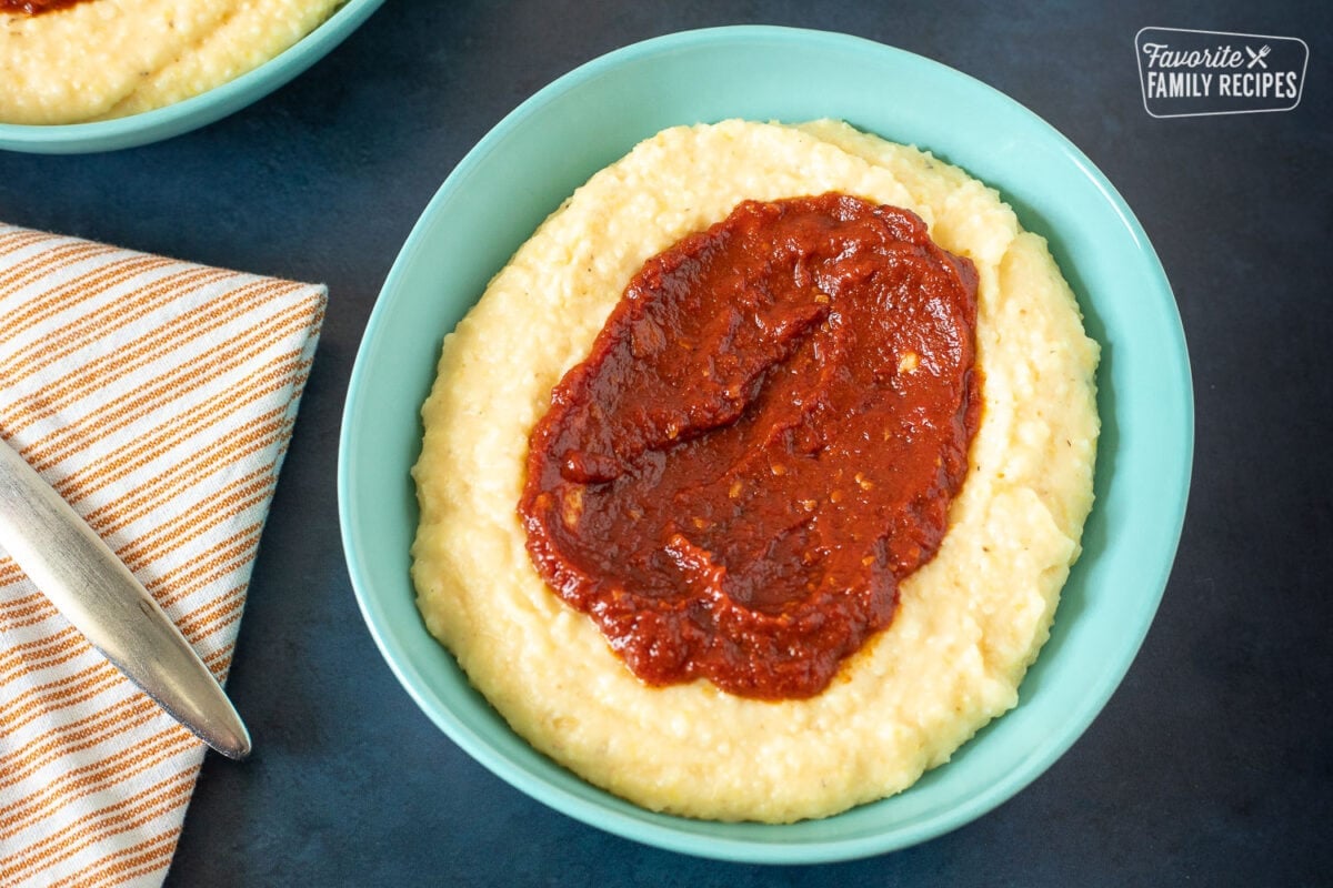 Grits with cajun tomato sauce on top