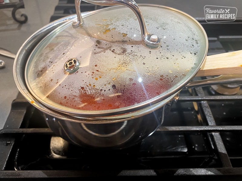 Covered tomato sauce in a sauce pan